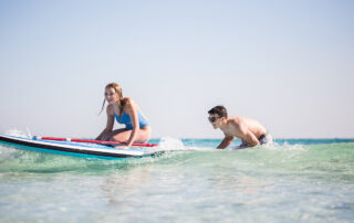 Paddleboarding on Blue Mountain Beach